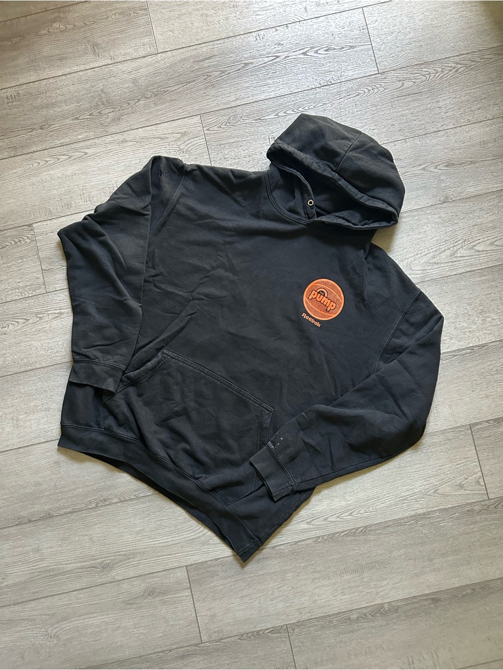 Reebok Men’s Black Crewneck Hoodie with Orange Pump Logo